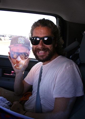 Man in car with friend