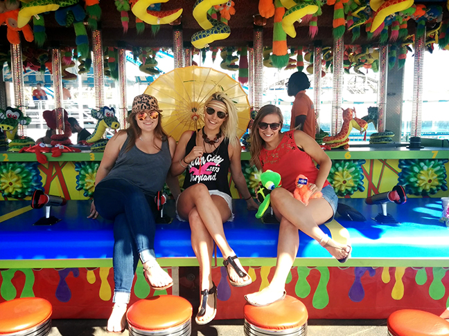 Girls in Coney Island amusement park