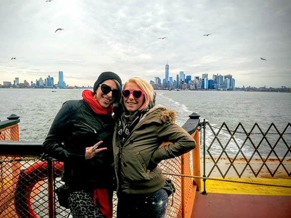 Two girls riding the Staten Island Ferry