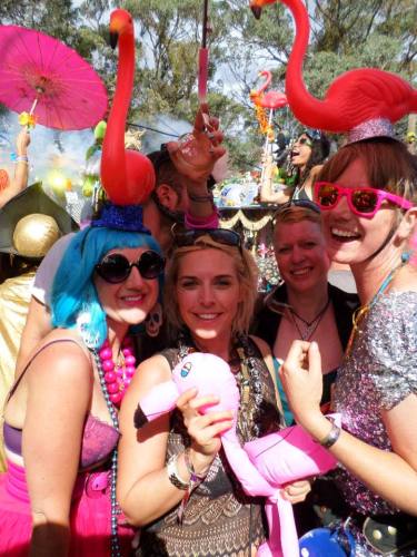 girls with flamingos at festival