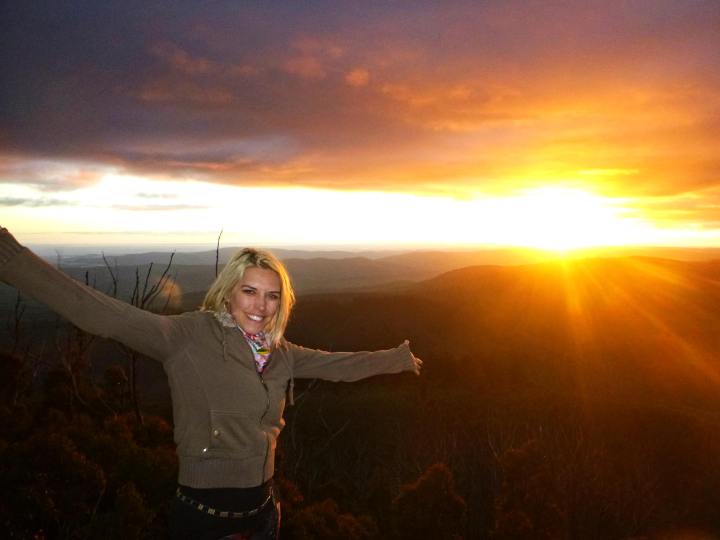 Girl in front of sunset