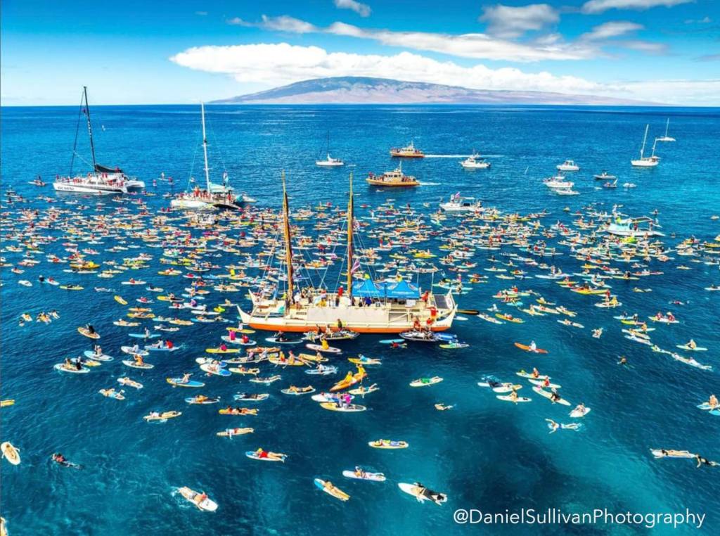 People gathered by the thousands to paddle out on Lahaina shores to celebrate, remember, and reflect on what once was.